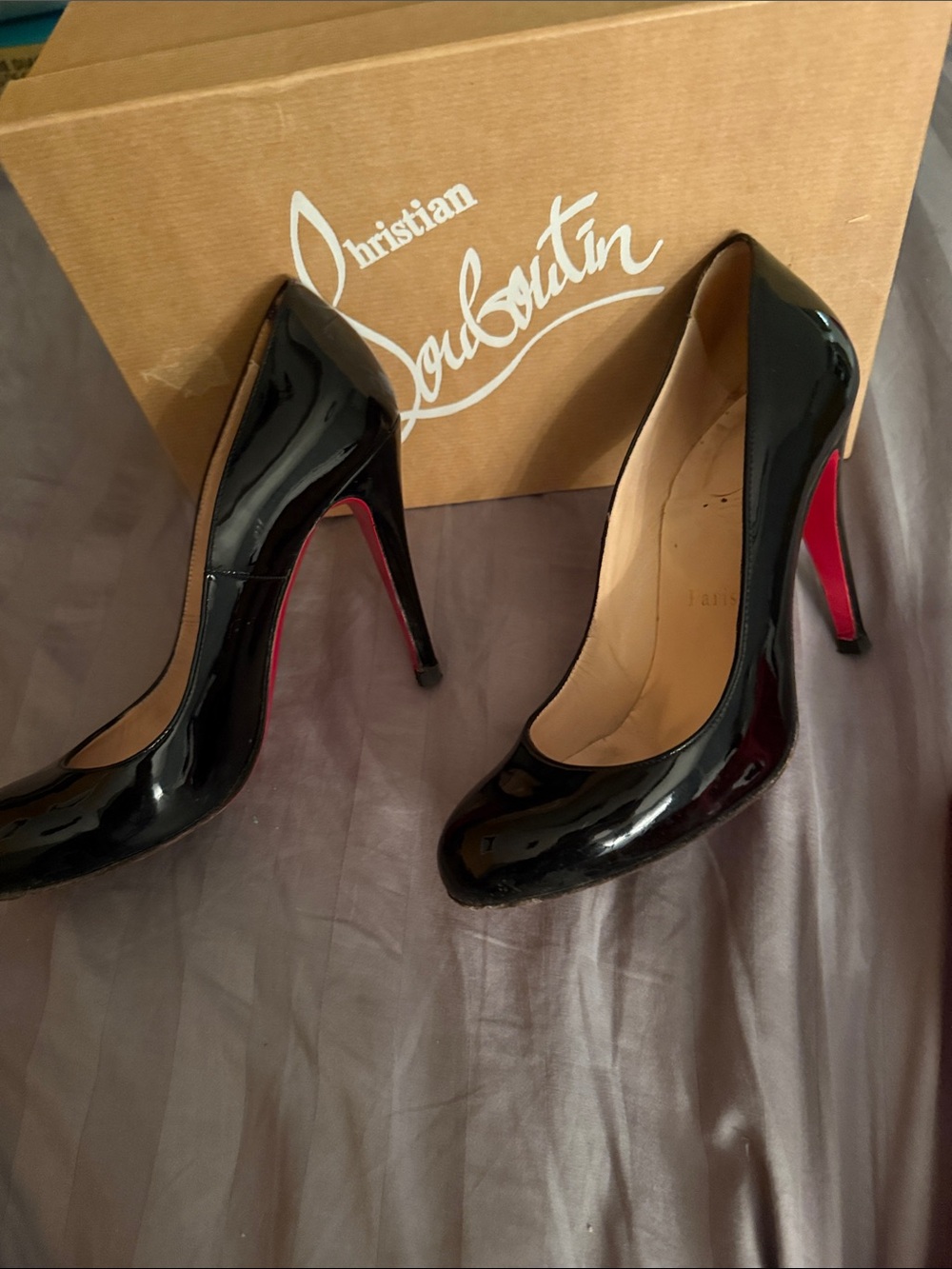 Christian Louboutin Black Patent Pumps with Red Soles